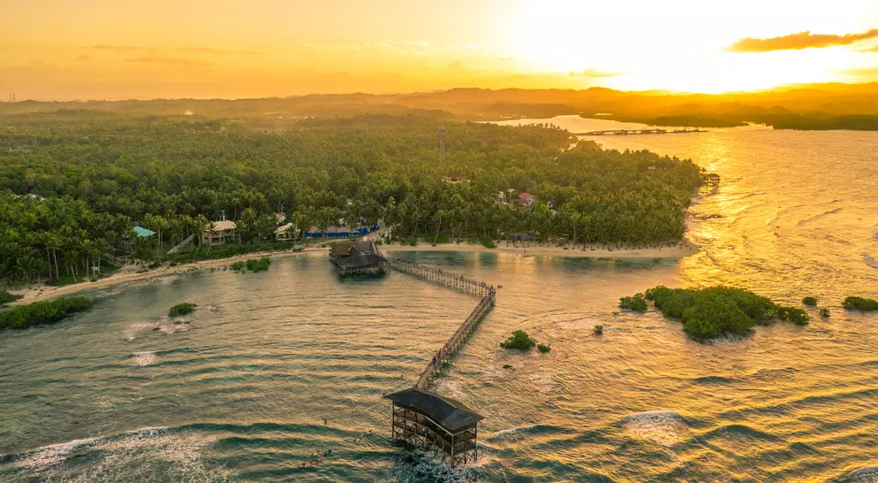 Sunset at world-renowned Cloud Nine Surfing Area, Siargao Island, Philippines