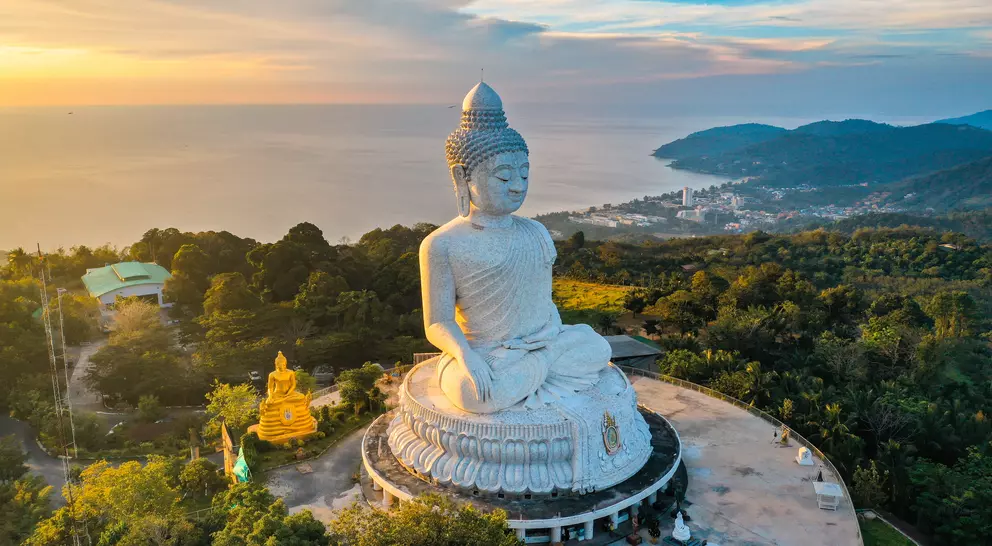 Aerial view of Big Buddha viewpoint at sunset on Phuket with a view of the water and coast below