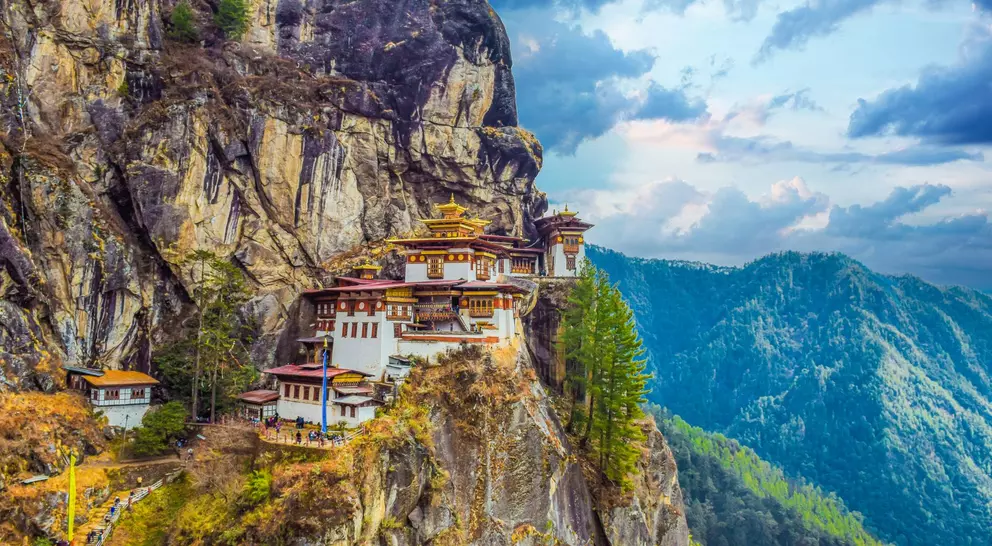 The Taktsang Palphug (Tiger’s Nest) monastery clings to cliffs 1200m above the forested Paro Valley