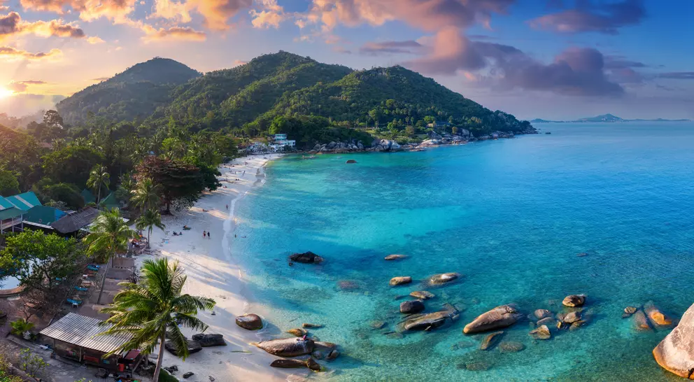 Bay and beach at sunset, stunning colours of the sky and water