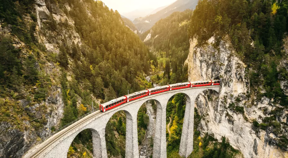 Train crossing Landwasser Viaduct on rhaetian railway in Filisur – Albula, Graubunden, Switzerland