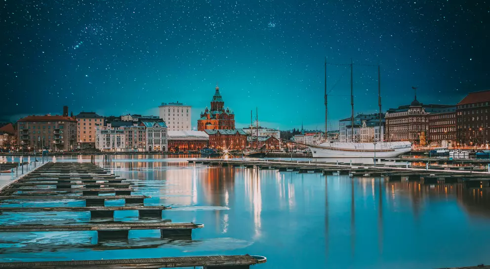 View Of Evening City And Uspenski Cathedral From Pier. Light Blue Dramatic Sky. Azure Color Sky