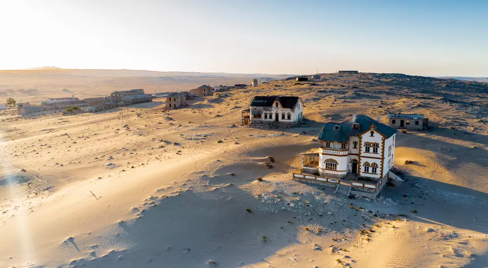Deserted homes in Kolmanskop ghost town near Luderitz in Namibia, the site of an abandoned diamond mine