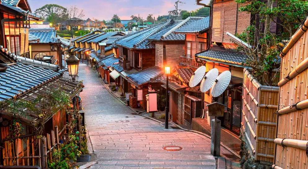 Traditional winding street in Gion, Kyoto, Japan at dawn