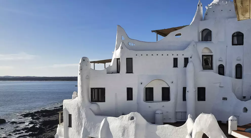 Scenic ocean vista from white building Casapueblo, which took artist Carlos Páez Vilaró 36 years to complete