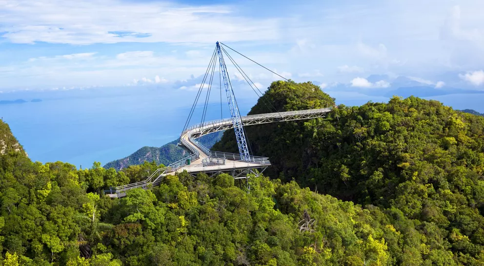 Amazing cable bridge over the tropical rainforest island landscape