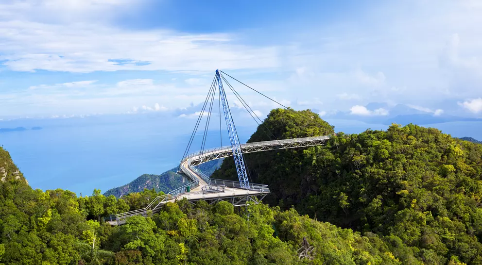 Amazing cable bridge over the tropical rainforest island landscape