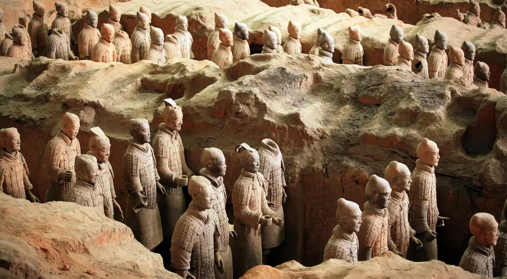 Terra-cotta army soilders, part of an elaborate mausoleum created to accompany the first emperor of China into the afterlife