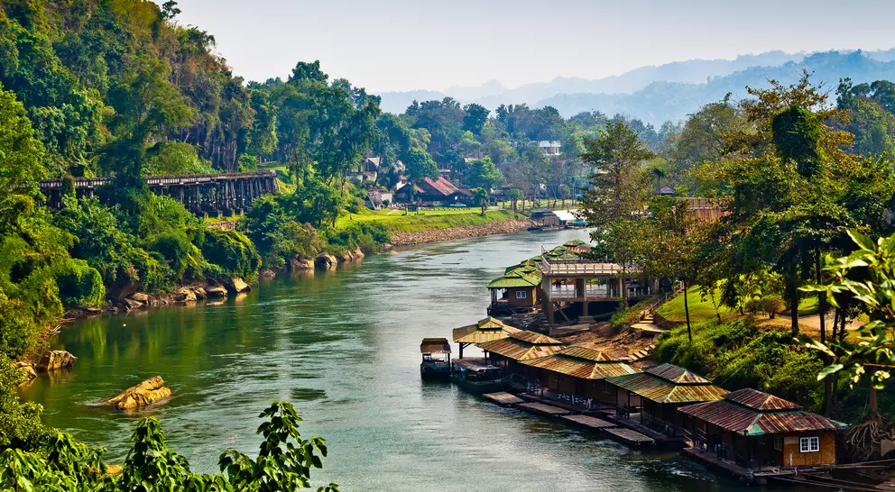 River winds between rural villages