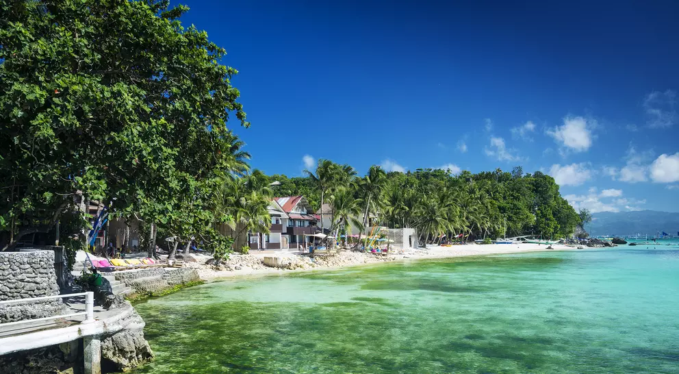 Beach in tropical paradise with stunning emerald waters