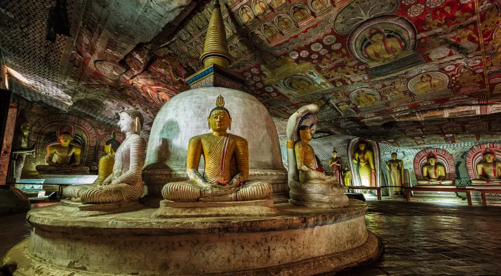 Buddha statue inside Dambulla cave temple, Sri Lanka.