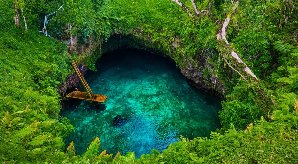 Famous swimming hole surrounded by lush forest