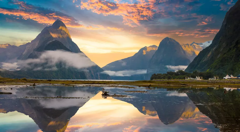 Famous Mitre Peak rising from the Milford Sound fiord. Fiordland national park,