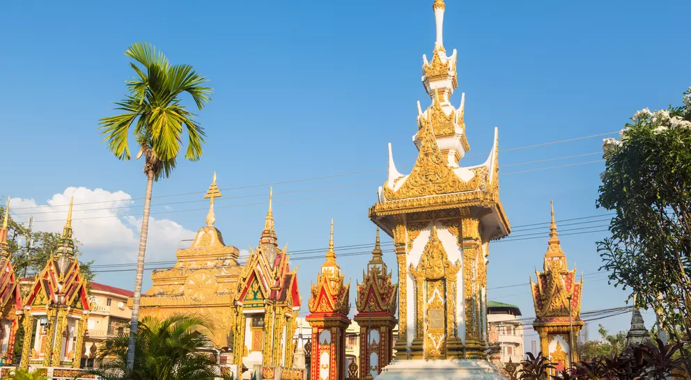 Buddhist stupas with palm trees