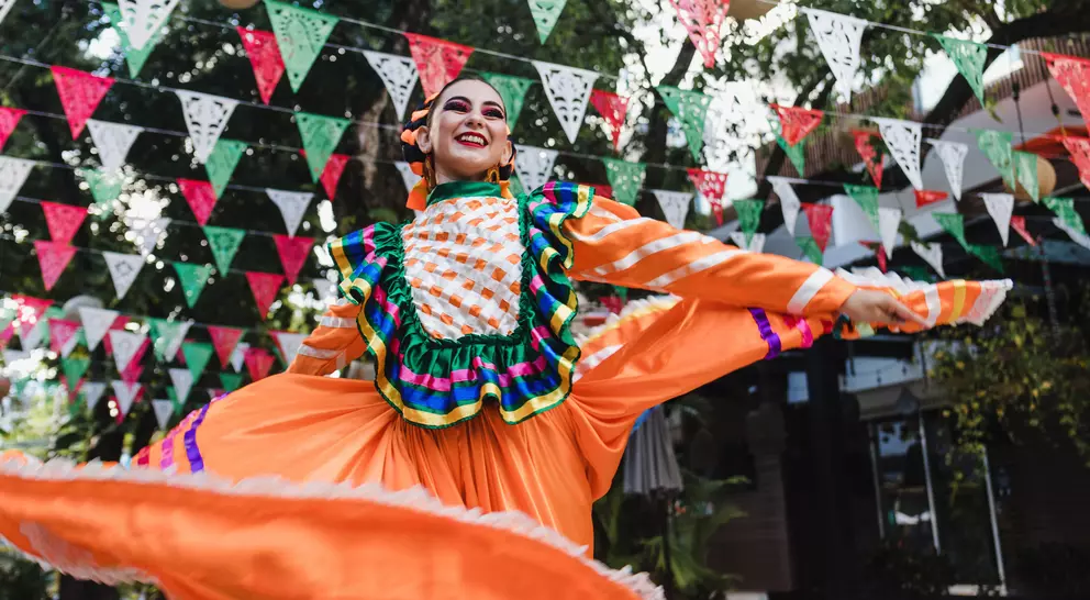 A dancer in traditional garb during a cultural festival in Guadalajara, Mexico.