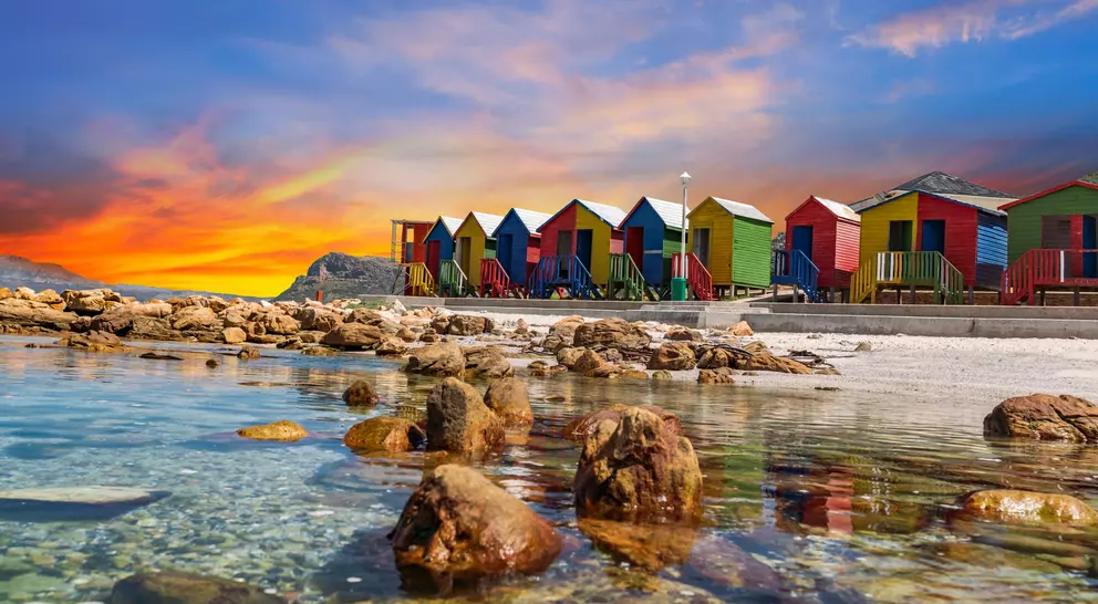 Muizenberg beach huts wooden cabins at twilight in Cape Town South Africa