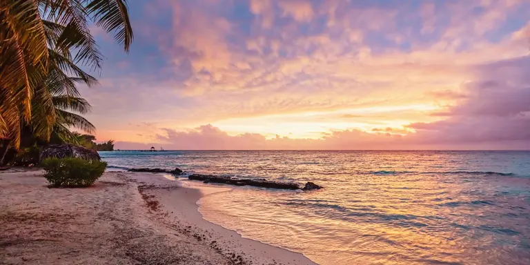 Colorful vibrant sunset over the pacific ocean at scenic natural beach