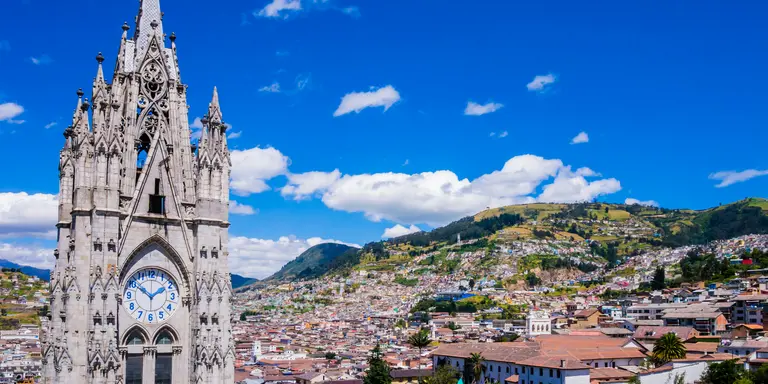 basilica in the old town of Quito against the backdrop of the hillside