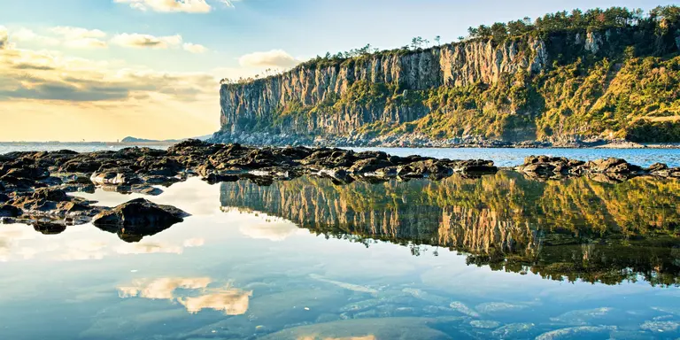 A reflection of coastal cliffs
