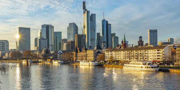 Frankfurt skyline in sunset with river Main