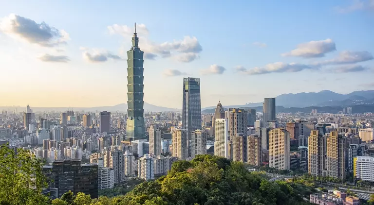 Taipei city viewed from the Mount Elephant in the evening, featuring Taipei 101 skyscraper