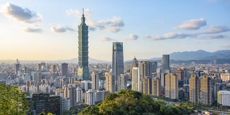 Taipei city viewed from the Mount Elephant in the evening, featuring Taipei 101 skyscraper