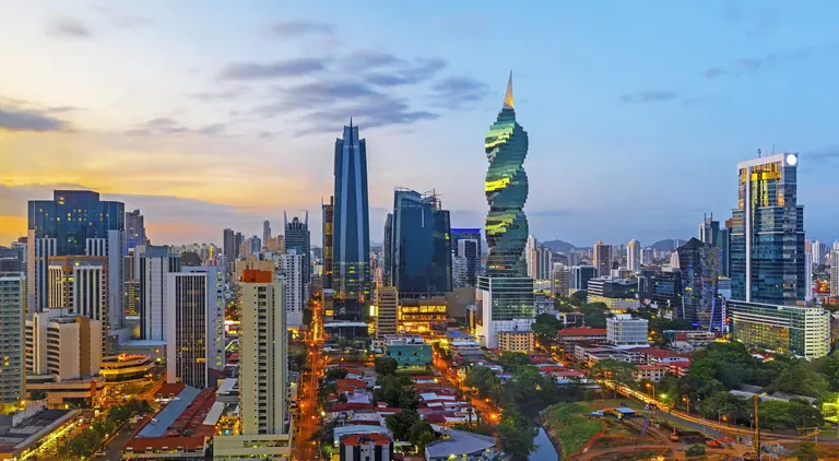 The skyline of Panama City with its skyscrapers in the financial district at sunset, Panama.