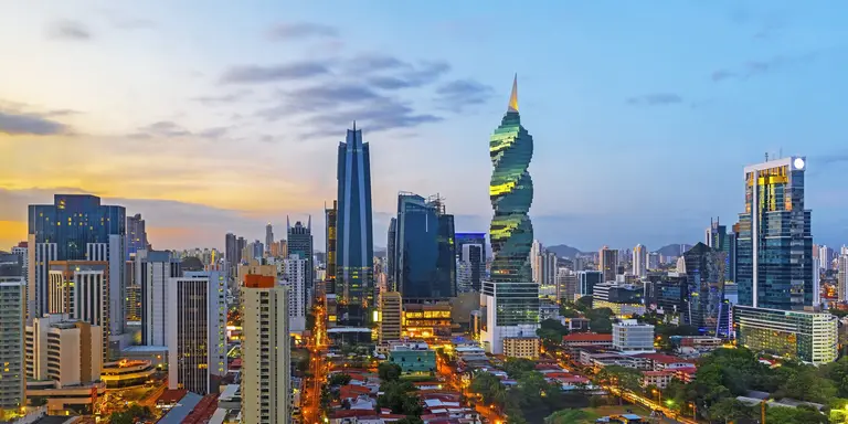 The skyline of Panama City with its skyscrapers in the financial district at sunset, Panama.