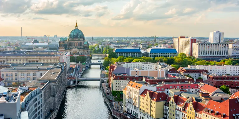 Berlin Cathedral (Berliner Dom) on Museum island and Spree river at sunset