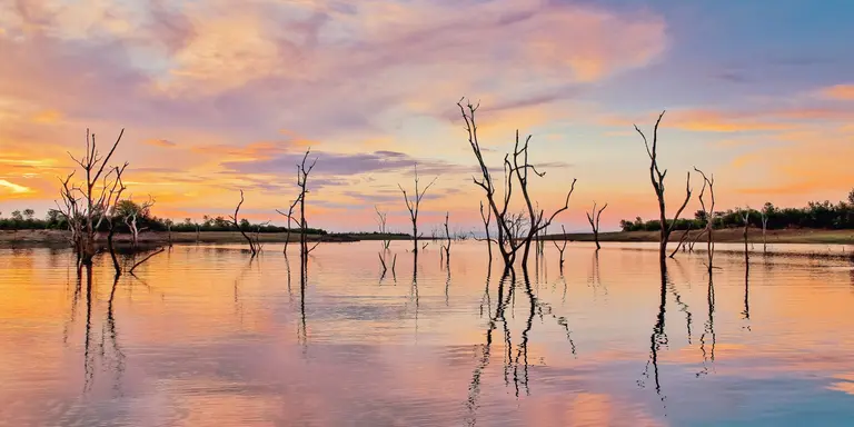 Lake Kariba is a man made lake, 226 km long and 40 km wide, located on the border between Zambia and Zimbabwe.