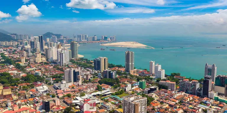 Panoramic aerial view of the city of Georgetown, with the straits of Malacca and Indian Ocean in the background