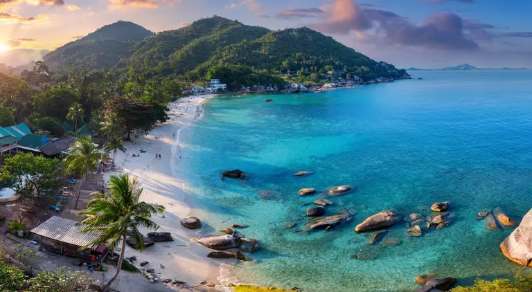 Bay and beach at sunset, stunning colours of the sky and water