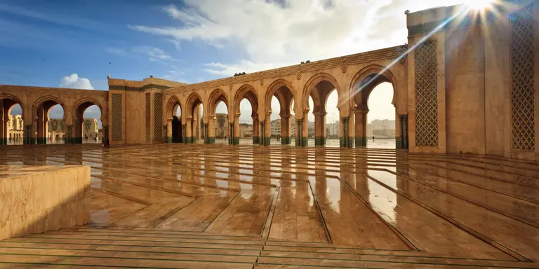 Sparkling marble arcade of Hamman II Mosque on a Sunny Day