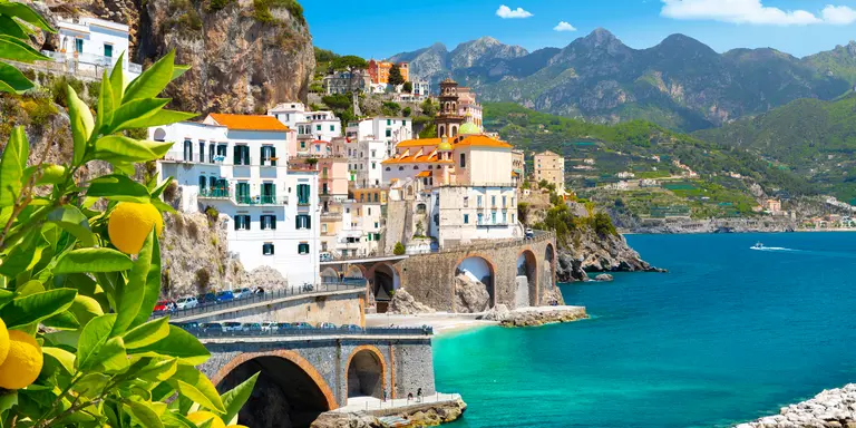 Beautiful view of the Mediterranean coast with lemons in the foreground