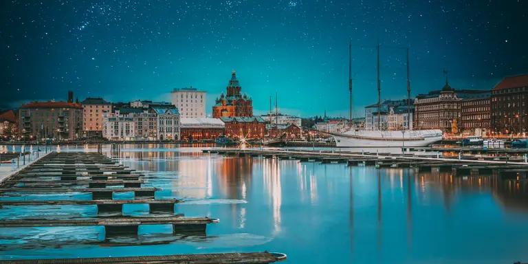 View Of Evening City And Uspenski Cathedral From Pier. Light Blue Dramatic Sky. Azure Color Sky