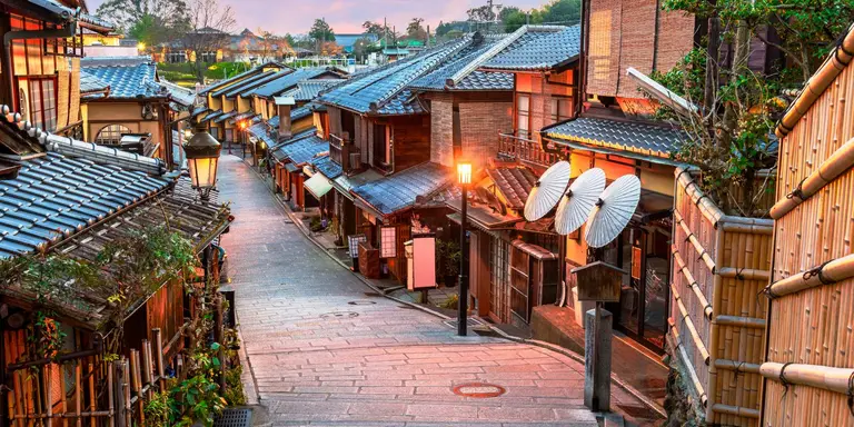 Traditional winding street in Gion, Kyoto, Japan at dawn