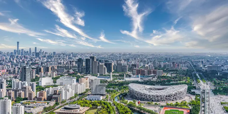 Beijing City aerial view featuring the Beijing National Arena, also known as The Bird's Nest, built for the 2008 Olympic arena 