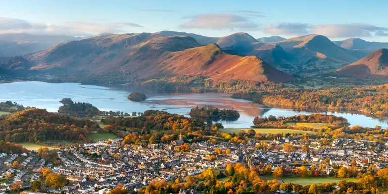 Aerial view of keswick town and surrounding mountains with Lake District National Park