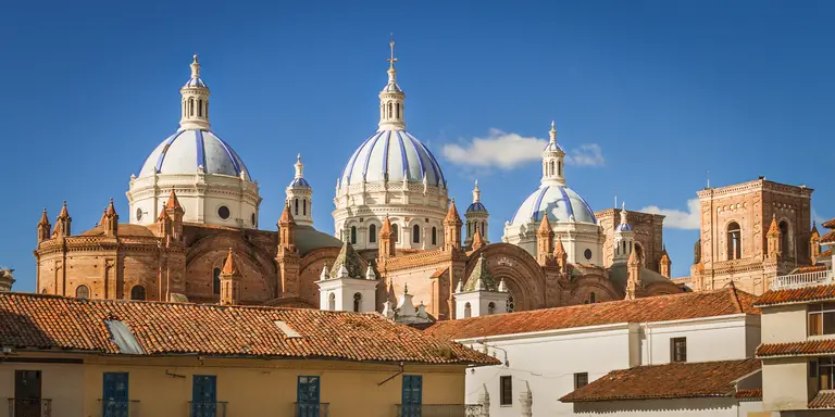 The New Cathedral of Cuenca,featuring series of sky-blue cupolas, is located in front of the Central Plaza in the Parque Calderon