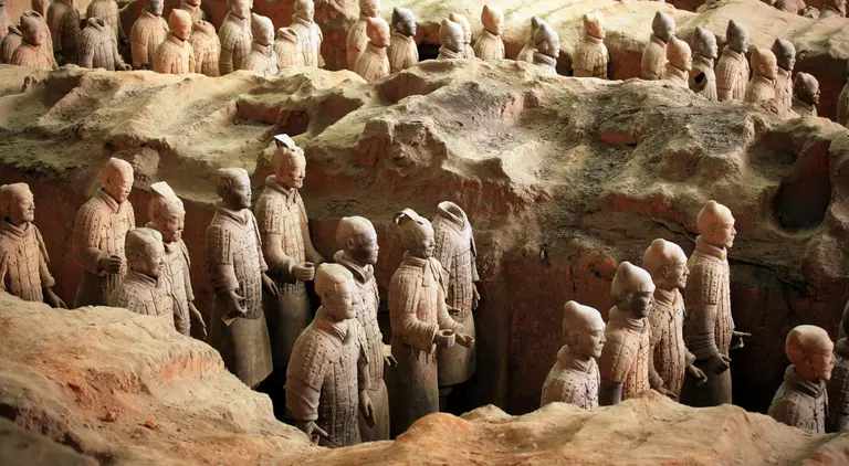 Terra-cotta army soilders, part of an elaborate mausoleum created to accompany the first emperor of China into the afterlife