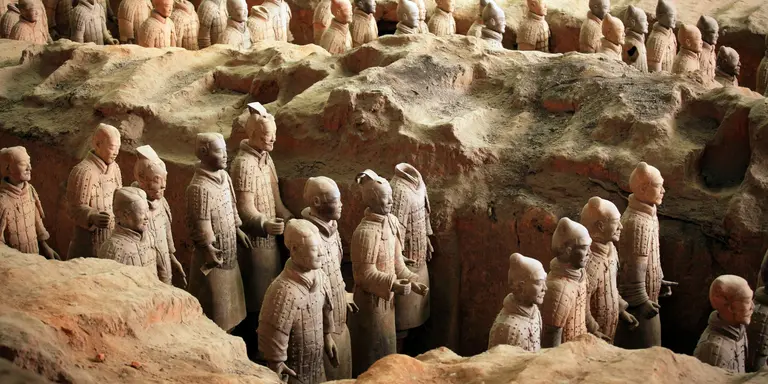 Terra-cotta army soilders, part of an elaborate mausoleum created to accompany the first emperor of China into the afterlife