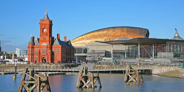 View of Cardiff city skyline from across the bay showing the Pier head building National Assembly