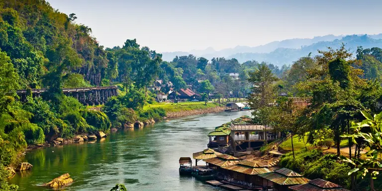 River winds between rural villages