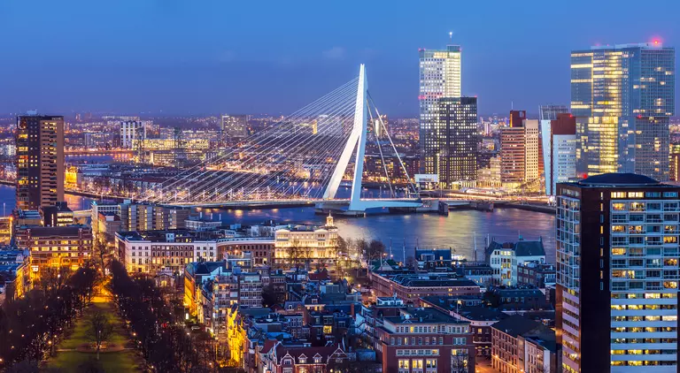 Aerial shot of Rotterdam skyline with Erasmus bridge at twilight as seen from the Euromast tower