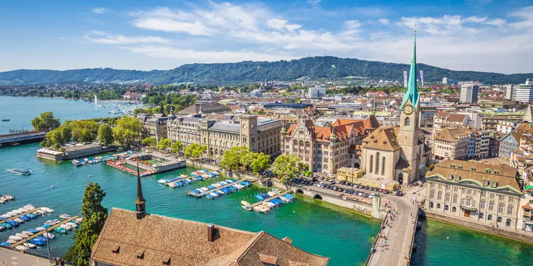 Aerial view of Zürich city center with famous Fraumünster Church and river Limmat at Lake Zurich from Grossmünster Church