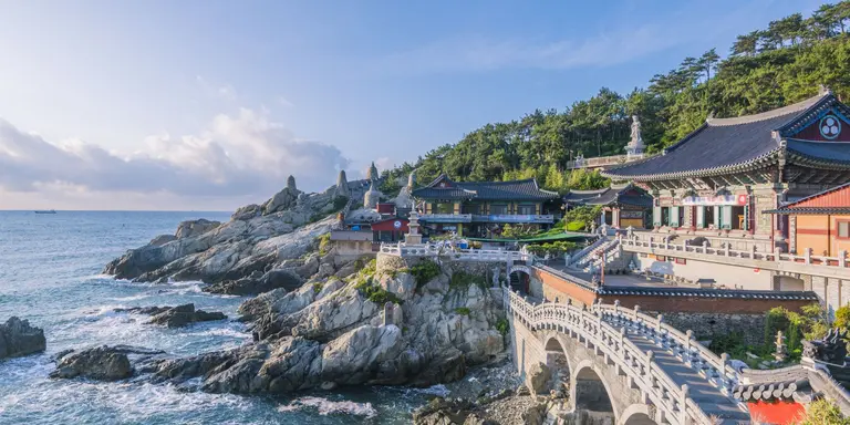 Haedong Yonggungsa Temple is situated on the edge of the rocky coast of the sea