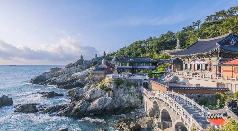 Haedong Yonggungsa Temple is situated on the edge of the rocky coast of the sea