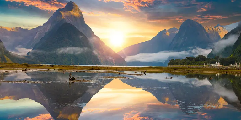 Famous Mitre Peak rising from the Milford Sound fiord. Fiordland national park, New Zealand