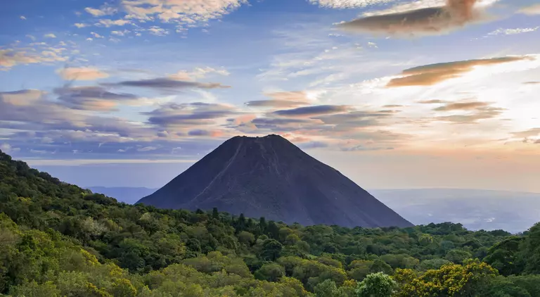 View of Izalco volcano with beautiful clouds around it in El Salvador
