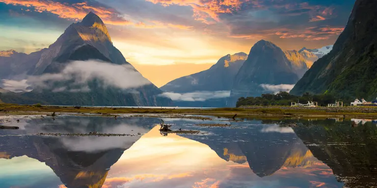 Famous Mitre Peak rising from the Milford Sound fiord. Fiordland national park,